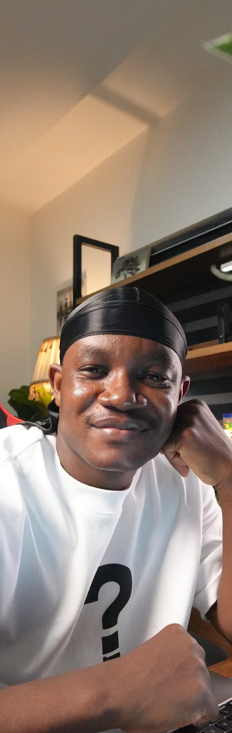 Michael Eneji working